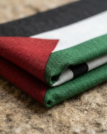 The Sovereign Flag — Hand-finished silk-screened Palestinian flag on heavyweight cotton.