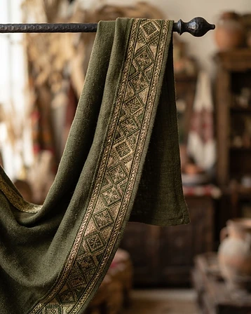 Tatreez Banner — Large-format textile banner with hand-embroidered geometric border.