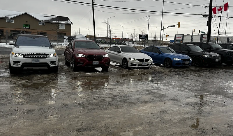 Customer vehicles lined up at Moonglo Auto Repair