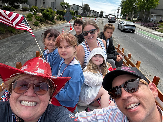 Casey and supporters on a community parade float