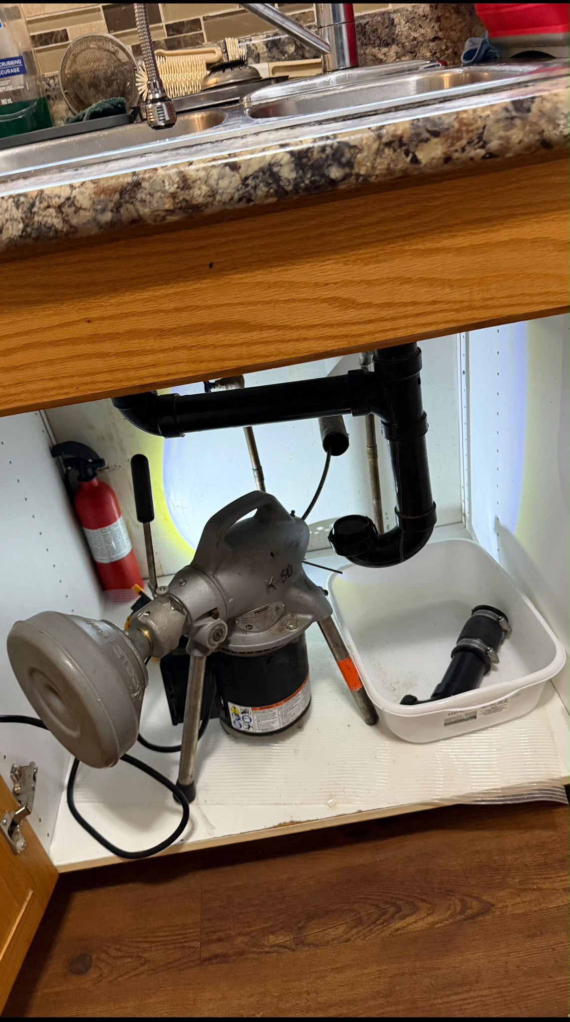 Drain cleaning service using a sectional drain machine