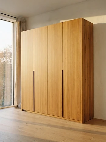 Monolith Wardrobe — hand-finished solid teak with straight grain and natural wax finish