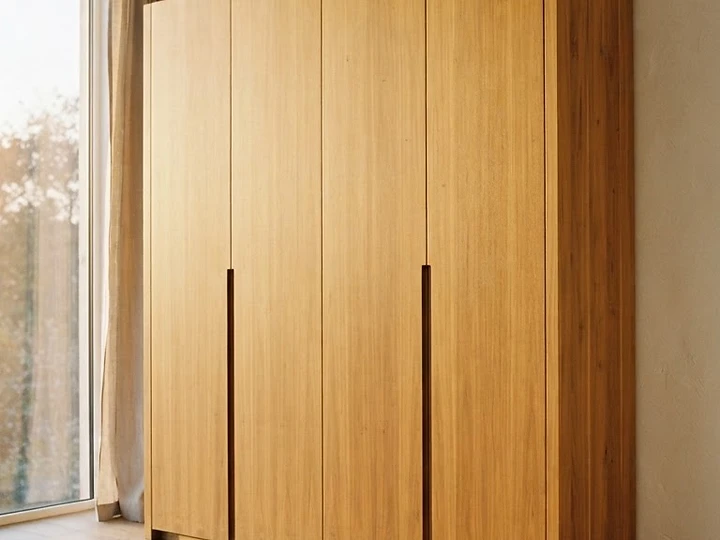 Monolith Wardrobe — hand-finished solid teak with straight grain and natural wax finish