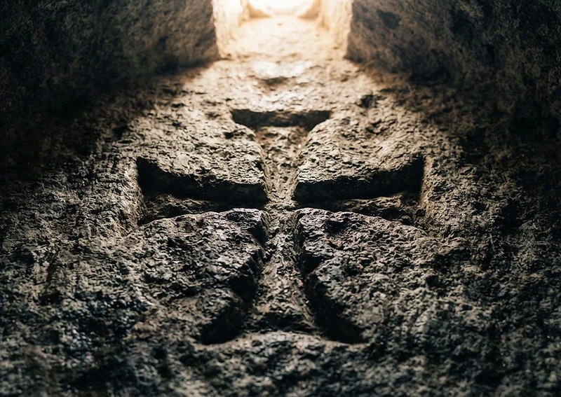 Knights Templar carved stone cross in ancient granite
