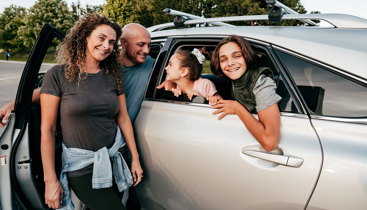 A family with their vehicle