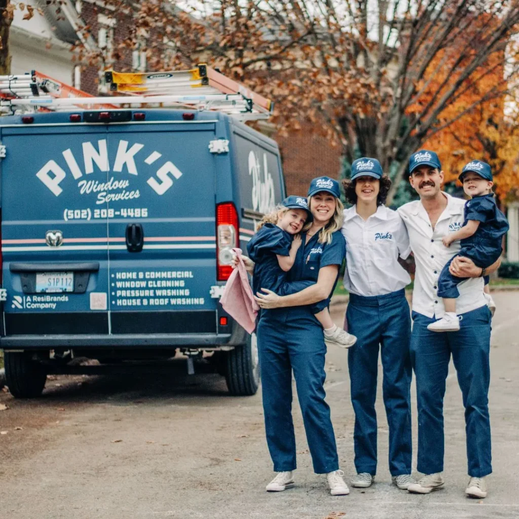 A family by their service vehicle
