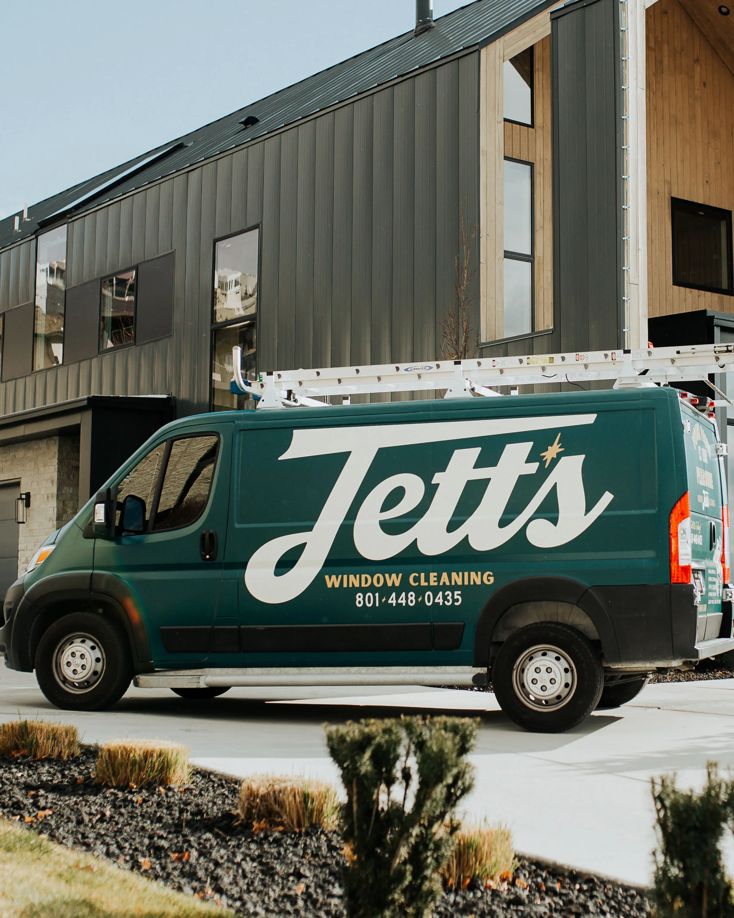 A local window cleaning service van