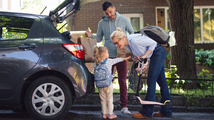 A family reviewing their insurance options