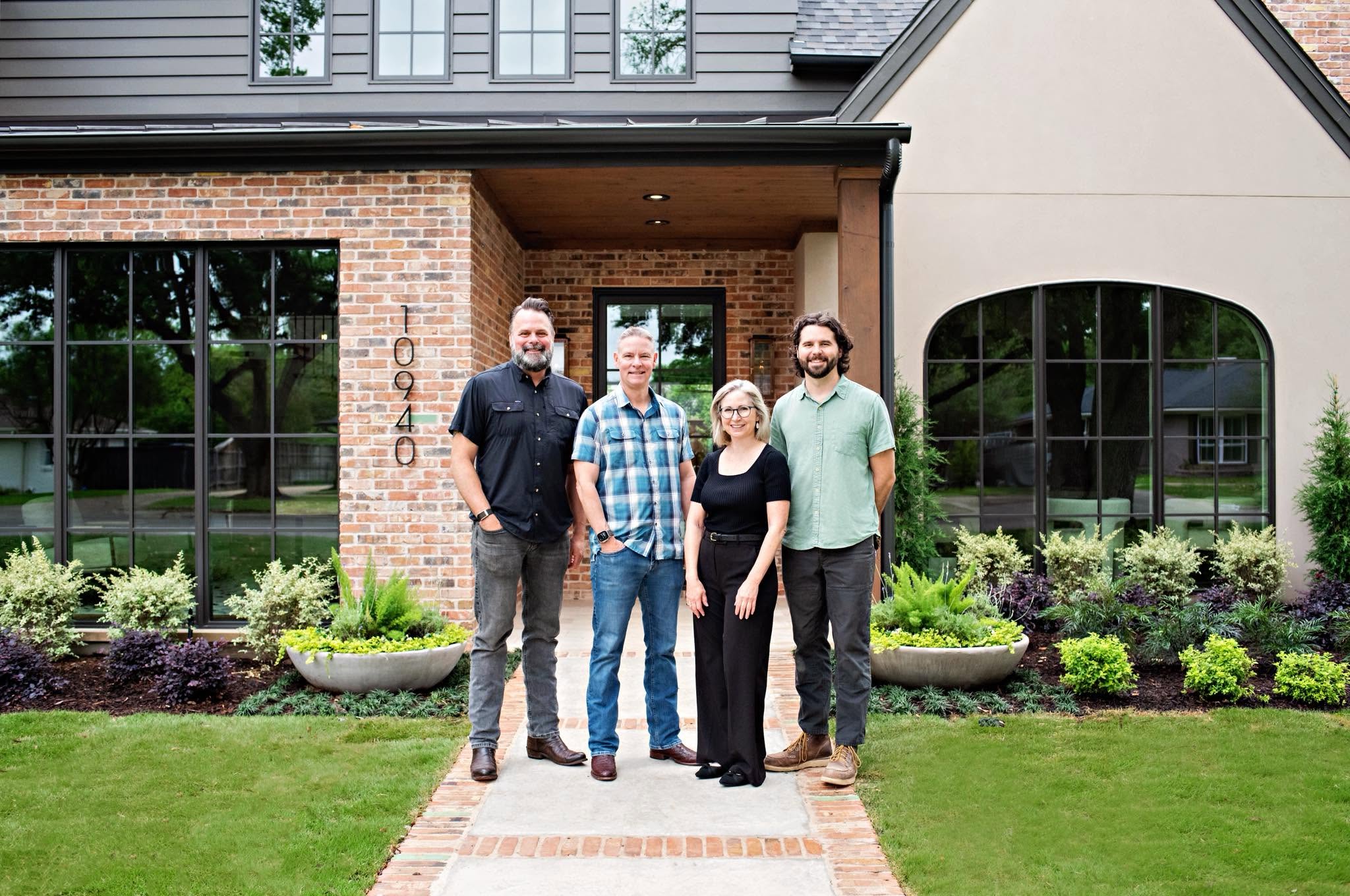 A group of friends in front of their home