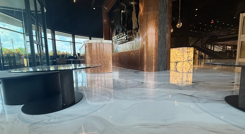 Polymetallic epoxy showroom floor — Executive Exteriors commercial project