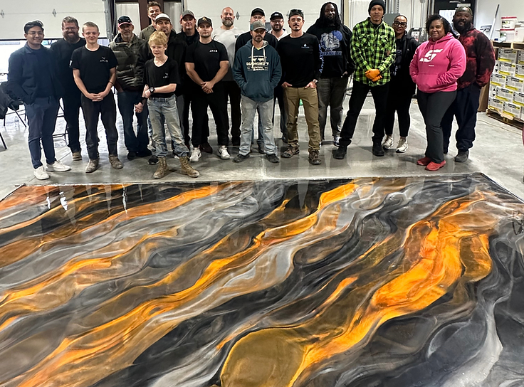Hands-on training school — group behind a finished metallic floor