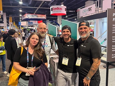 Concrete and coatings professionals at an industry trade show