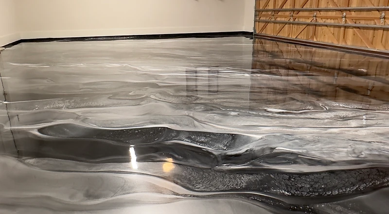 On-site concrete coatings field training — plastic containment and substrate prep on a real job