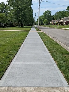 Broom-finish concrete sidewalk