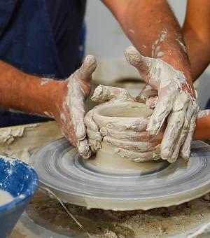 At the wheel · Pottery