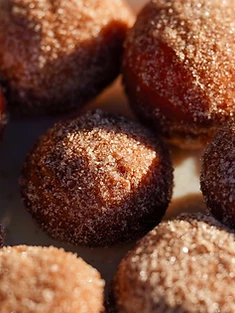 Castagnole, sugar-dusted