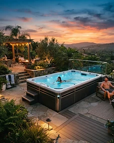 Modern swim spa in a luxury backyard at sunset