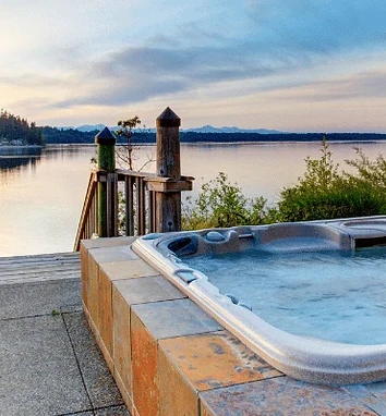 Swim Spas — Shop premium home wellness products at Hearthside Supply Premium swim spas combining aquatic exercise pools and hot tub hydrotherapy for year-round backyard fitness