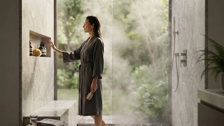 A luxurious modern home steam shower environment for wellness and recovery.