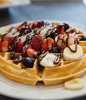 Fresh fruit waffle with chocolate drizzle