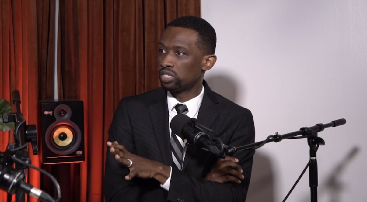 Jelks recording a podcast