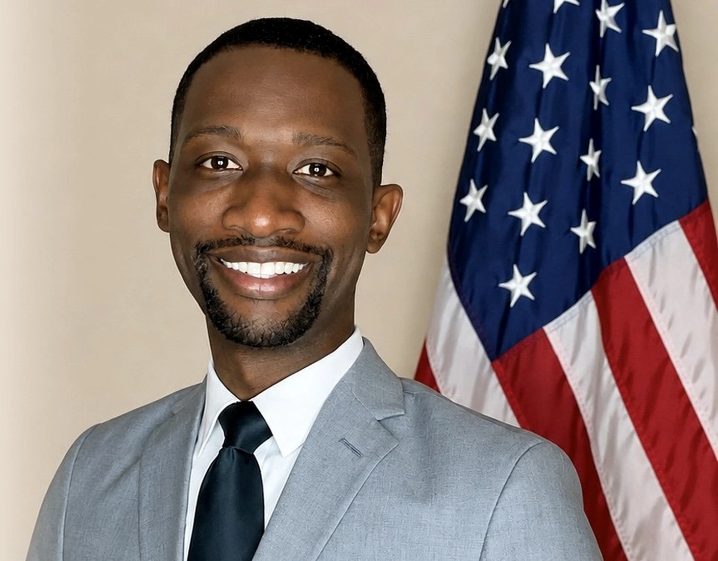 Craig Jelks with an American flag