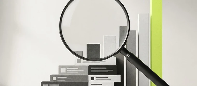 A magnifying glass over search results and a rising graph representing SEO