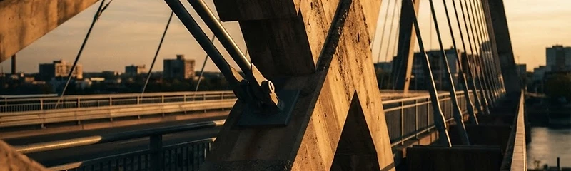 Modern architectural bridge at sunset