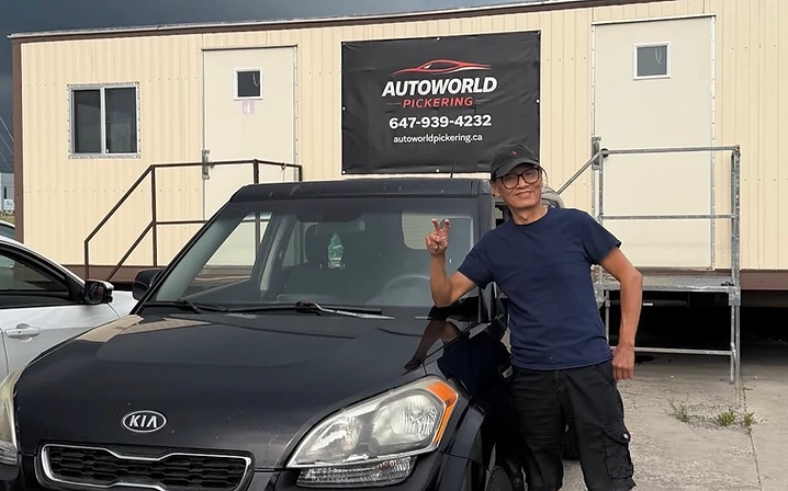 Customer with black Kia Soul