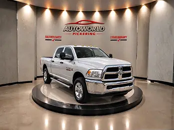 2013 Ram 3500 Cummins in White on showroom platform