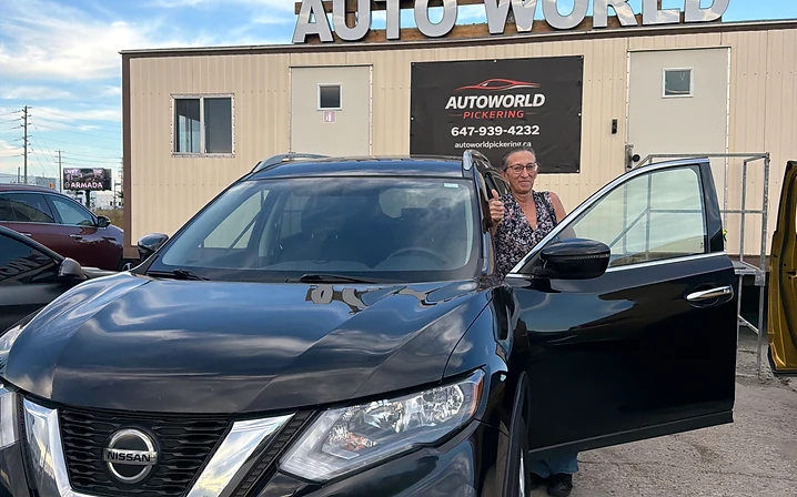 Customer with black Nissan SUV