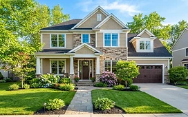 A clean two-story home with clean windows, illustrating residential window cleaning in Plymouth, Michigan.