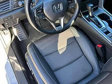 Freshly shampooed and restored car interior with clean seats and trim
