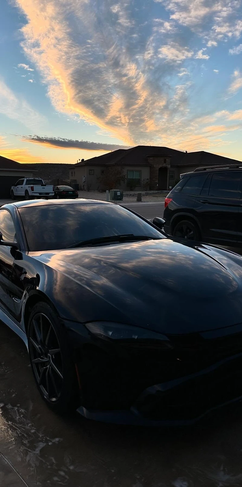 Detailed luxury car exterior gleaming after a professional mobile detail