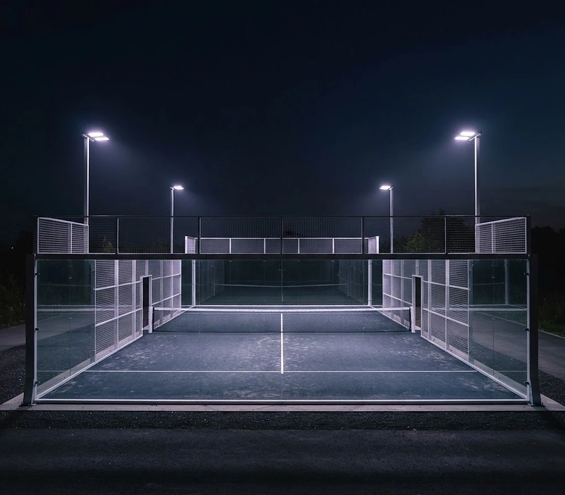 Architectural padel court at blue hour