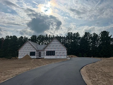 4442 Ridgewater Run - home under construction with weather wrap and dark metal roof