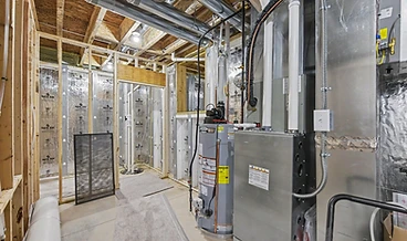 Mechanical room with a water heater, HVAC unit, and exposed ductwork