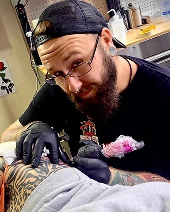 Ashlar Tattoo Company artist at work — custom tattoo artist in Madison, Indiana