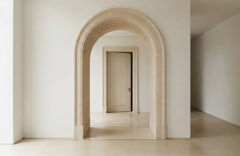 A monumental ivory architectural doorway
