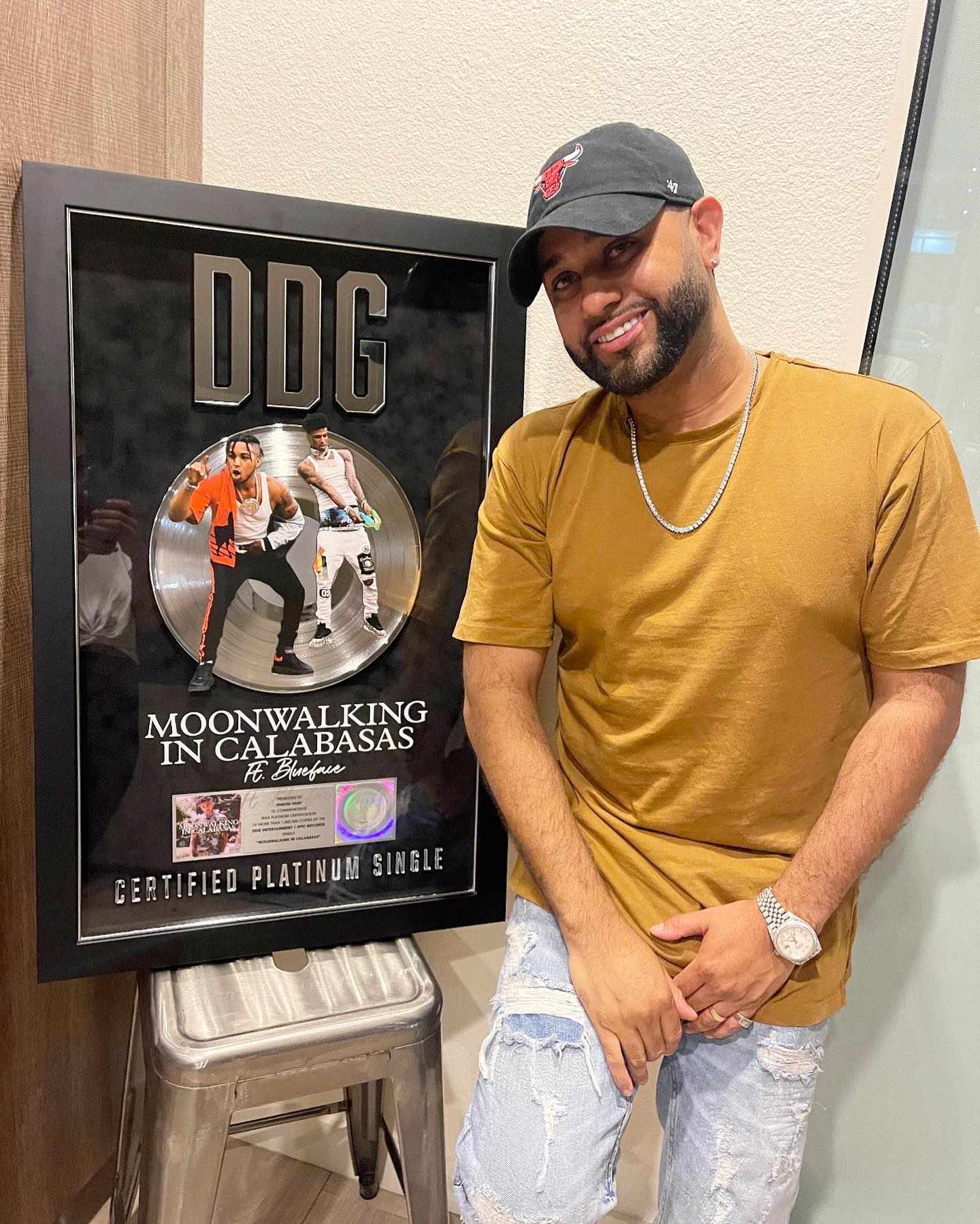 Dimitri Hurt with DDG RIAA Platinum Record plaque for Moonwalking in Calabasas