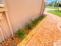 River Stone & Herringbone Pavers