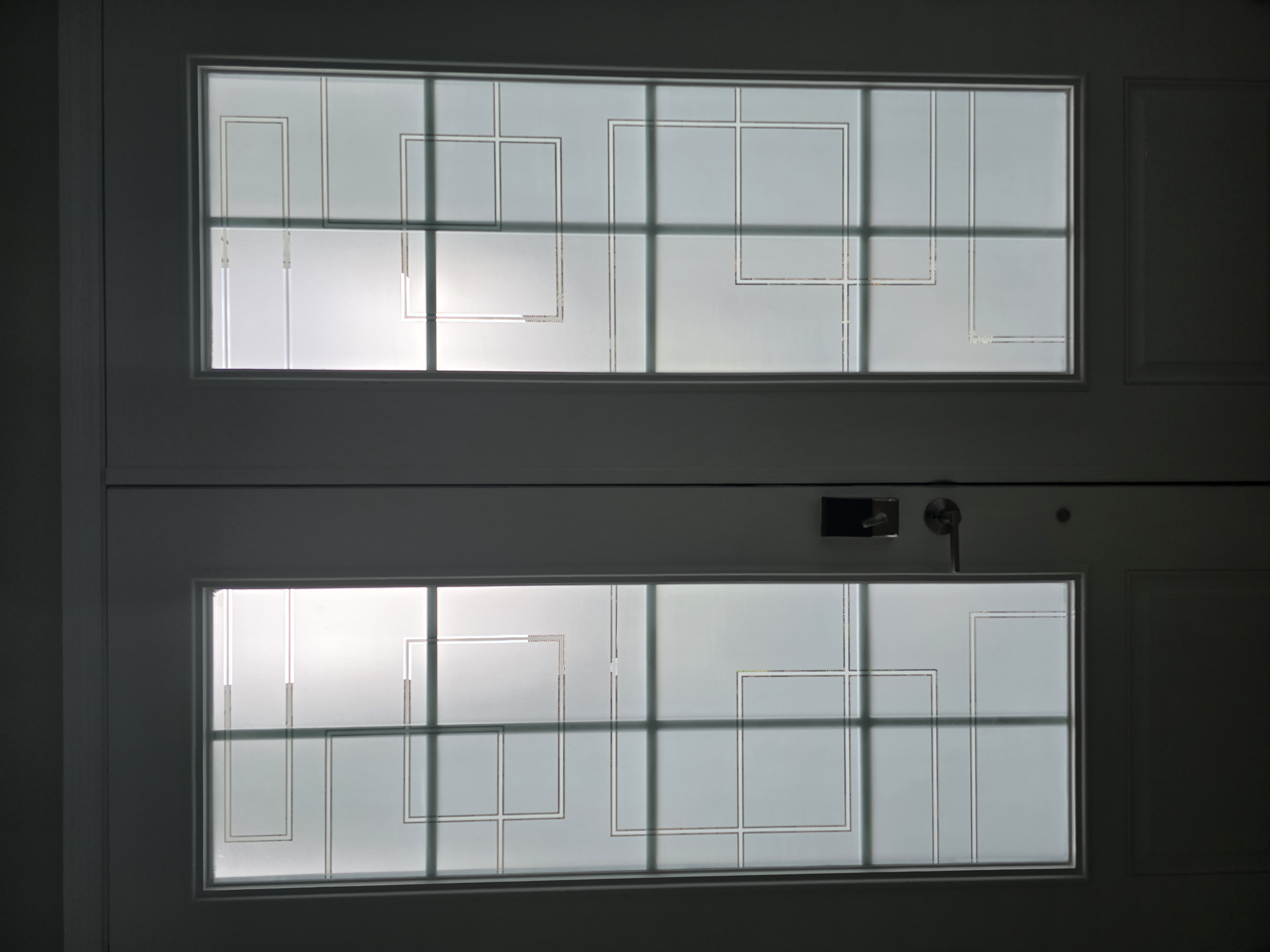 Grand commercial building with tinted arched windows