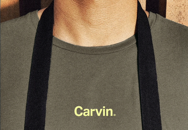 Carvin team member in branded apron