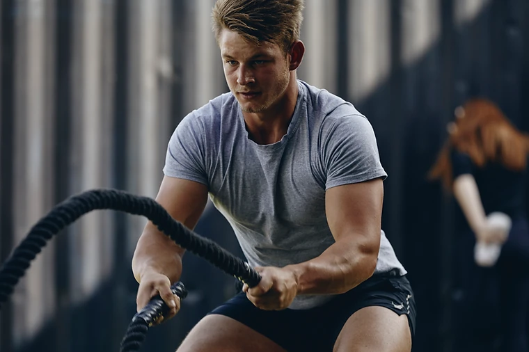 Member training with battle ropes