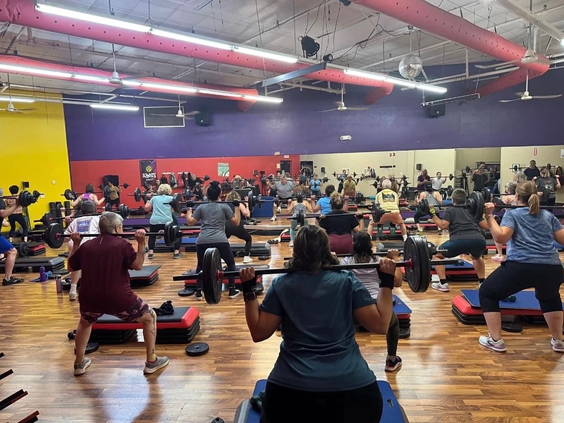 Packed group fitness class in the studio