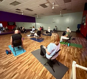 Chair yoga class in the studio