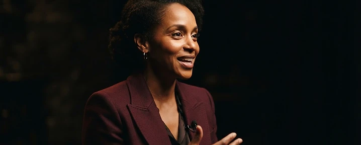 Dr. Maricia Sherman teaching in warm low light