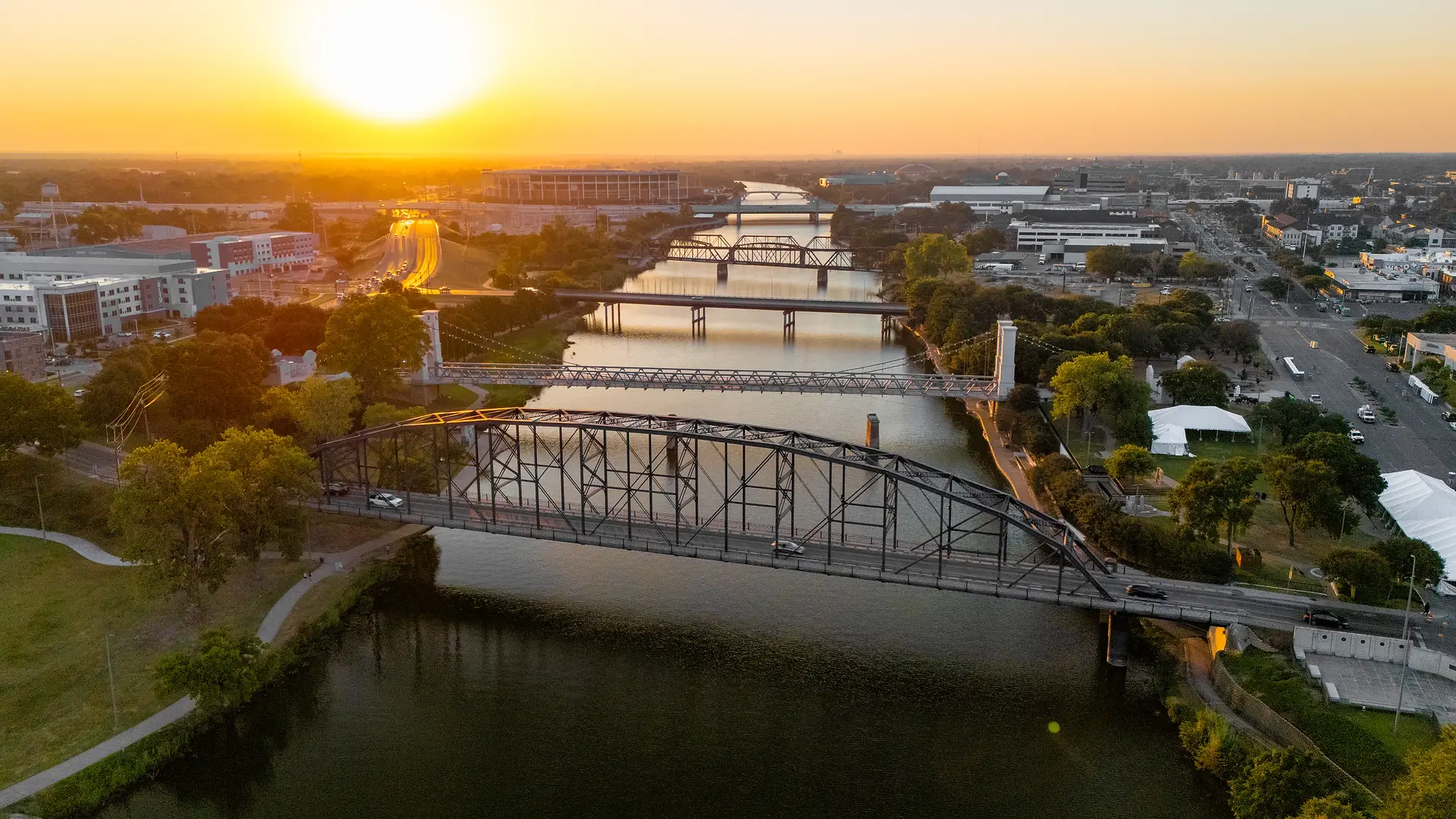 Aerial view of the Brazos River and downtown Waco Texas at sunset