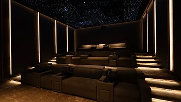 Continuum seating in a warm, low-lit cinema with starlight ceiling