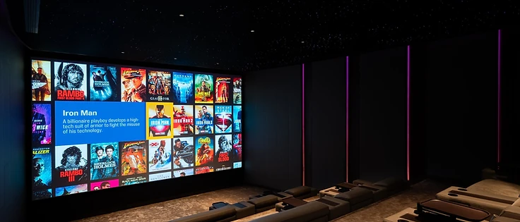 Continuum private cinema — screen view across tiered seating